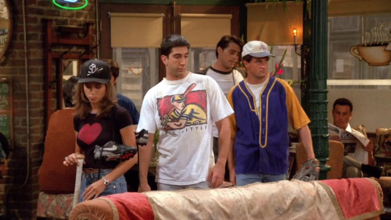 Nike Baseball Cleats Held by Jennifer Aniston (Rachel Green) in Friends Season 1 Episode 3 