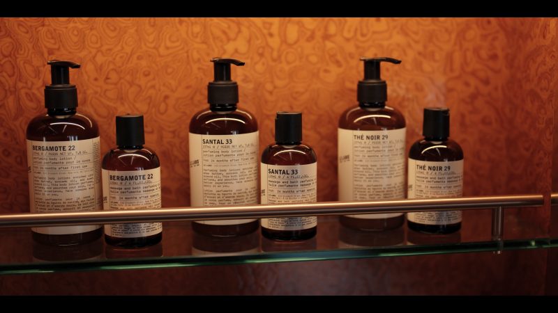 Le Labo perfuming body lotions and massage & bath perfuming oils in All’s Fair S01E08 