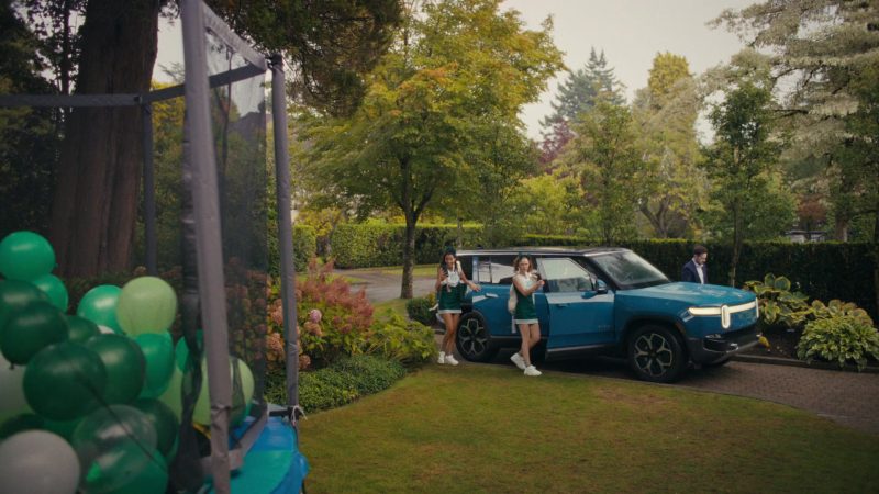 Rivian R1S electric SUV in Watson S02E09 “Shannon Says Bex Loves Micah” (2025)