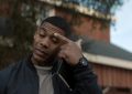 John Stewart wearing a black Casio G-Shock in Lanterns Episode 1